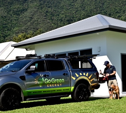 Go Green Energy owner and his dog installing a Cairns solar system